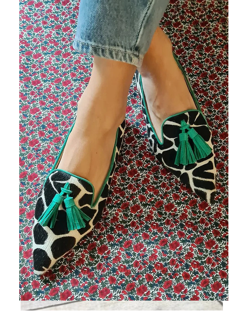 Greta · Cow Print Pointed Tassel Loafers