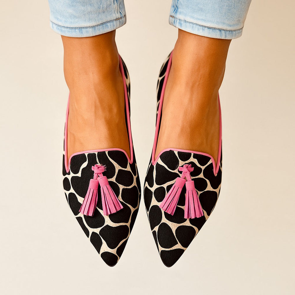 Greta · Cow Print Pointed Tassel Loafers