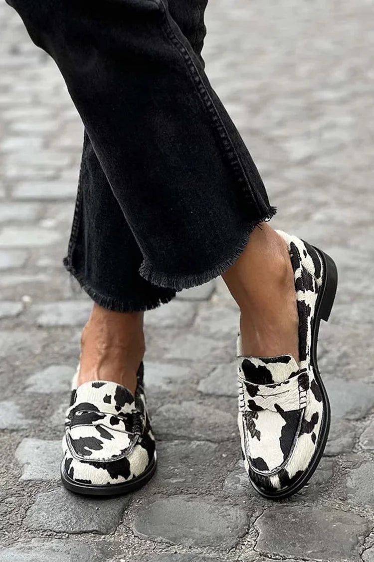 Jordana · Cow Print Lug Sole Loafers