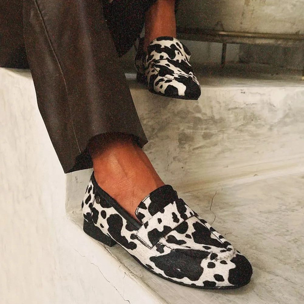 Mila · Cow Print Round-Toe Loafers
